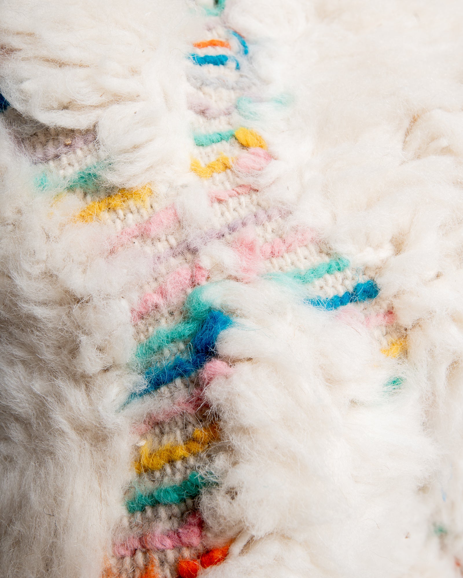Modern, designer, handcrafted Berber rug from Morocco. Beniourain carpet with beautiful colours and patterns and fluffy wool texture.